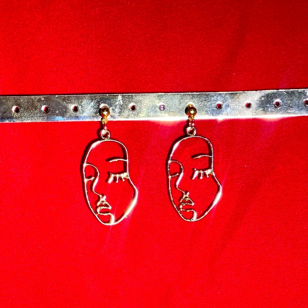 Gold Woman’s Face Earrings